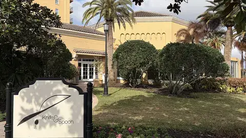 The Knife & Spoon sign at the restaurant entrance